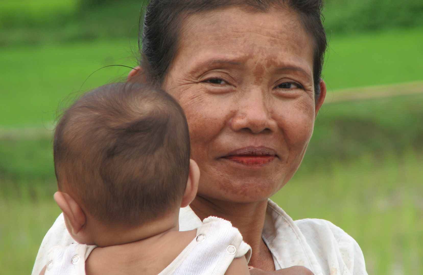 Lao women with a child
